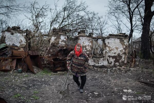 Sakhanka is a village in the Novoazovsky district of the Donetsk region, located on the line of contact. More than 1,000 people lived here before the conflict. Now almost everyone has left. The village was often shelled and many houses were destroyed. - Sputnik International