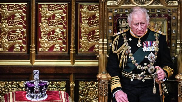 Britain's Prince Charles sits by the The Imperial State Crown in the House of Lords Chamber during the State Opening of Parliament - Sputnik International