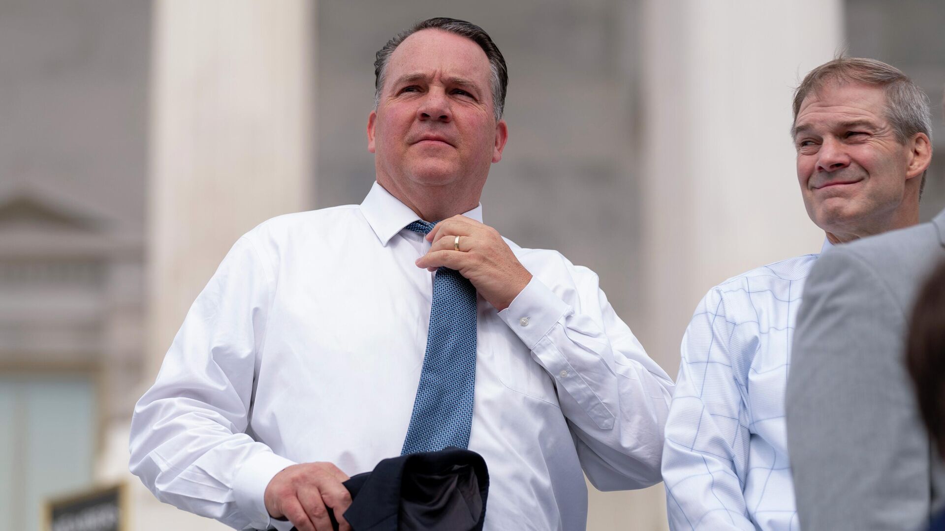 Rep. Alexander Mooney, R-W.Va., left, and Rep. Jim Jordan, R-Ohio, right, appear at a news conference on the steps of the Capitol in Washington, July 29, 2021. Mooney faces Rep. David McKinley, in a Republican primary on Tuesday, May 10, 2022, in West Virginia's 2nd Congressional District. - Sputnik International, 1920, 11.05.2022