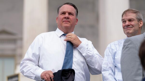 Rep. Alexander Mooney, R-W.Va., left, and Rep. Jim Jordan, R-Ohio, right, appear at a news conference on the steps of the Capitol in Washington, July 29, 2021. Mooney faces Rep. David McKinley, in a Republican primary on Tuesday, May 10, 2022, in West Virginia's 2nd Congressional District. - Sputnik International
