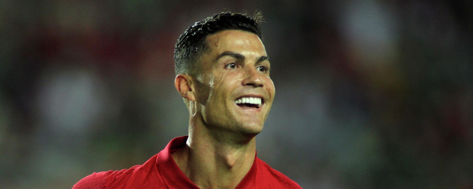 Portugal's Cristiano Ronaldo smiles after scoring the opening goal during the international friendly soccer match between Portugal and Qatar at the Algarve stadium outside Faro, Portugal, Saturday, Oct. 9, 2021 - Sputnik International, 1920, 24.11.2022