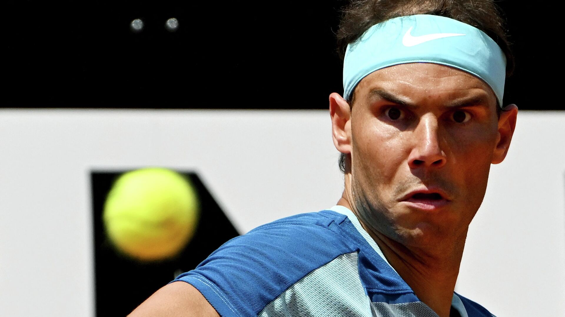 Spain's Rafael Nadal returns to USA's John Isner during their first round match at the ATP Rome Open tennis tournament on May 11, 2022 at Foro Italico in Rome - Sputnik International, 1920, 18.05.2022