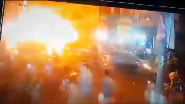 A screenshot from the security camera footage allegedly showing the moment of a blast in Karachi, Pakistan, on May 12, 2022. - Sputnik International