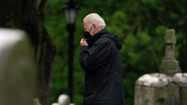 President Joe Biden walks among tombstones as he arrives at St. Joseph on the Brandywine Catholic Church in Wilmington, Del., to attend a Mass, Saturday, May 14, 2022. - Sputnik International