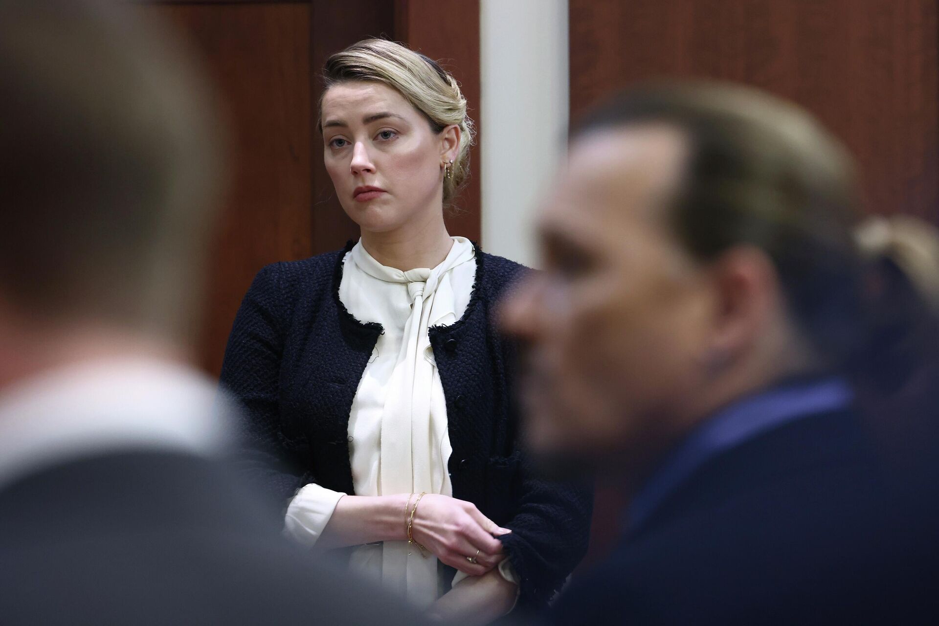 Actor Amber Heard returns after a break in the courtroom at the Fairfax County Circuit Court in Fairfax, Va., Thursday, May 5, 2022. - Sputnik International, 1920, 23.12.2022