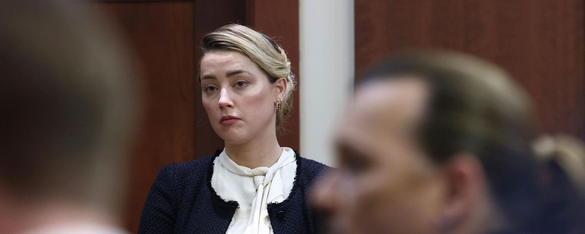 Actor Amber Heard returns after a break in the courtroom at the Fairfax County Circuit Court in Fairfax, Va., Thursday, May 5, 2022. - Sputnik International, 1920, 16.05.2022
