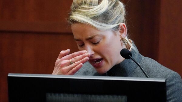Actor Amber Heard testifies in the courtroom at the Fairfax County Circuit Courthouse in Fairfax, Va., Monday, May 16, 2022 - Sputnik International