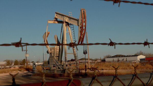 An oil pumpjack works in the Permian Basin oil field on March 13, 2022 in Odessa, Texas.  - Sputnik International