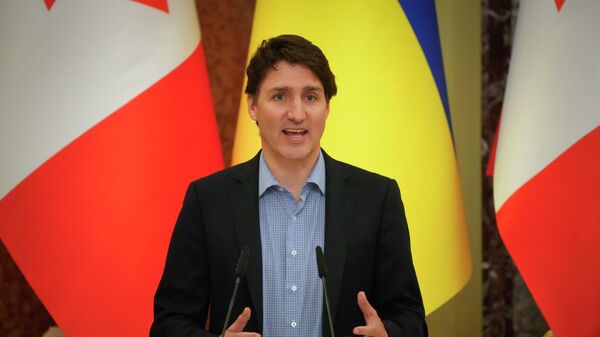 Canadian Prime Minister Justin Trudeau attends a news conference with Ukrainian President Volodymyr Zelenskyy after their meeting in Kyiv, Ukraine, Sunday, May 8, 2022. - Sputnik International