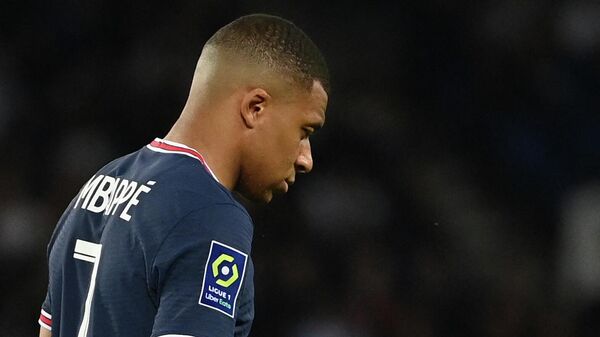 Paris Saint-Germain's French forward Kylian Mbappe reacts at the end of the French L1 football match between Paris-Saint Germain (PSG) and ES Troyes AC at The Parc des Princes Stadium in Paris on May 8, 2022 - Sputnik International