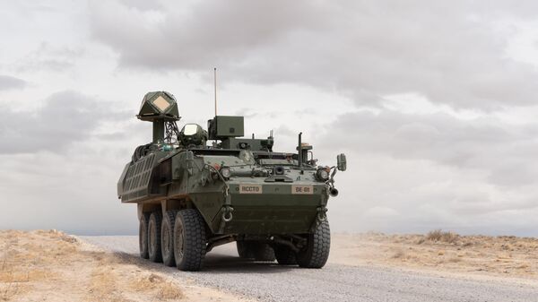 A 50-kilowatt-class laser mounted on a US Army Stryker vehicle , shown during a live-fire exercise at White Sands Missile Range in New Mexico. Part of the U.S. Army’s Directed Energy Maneuver-Short Range Air Defense, or DE M-SHORAD. - Sputnik International