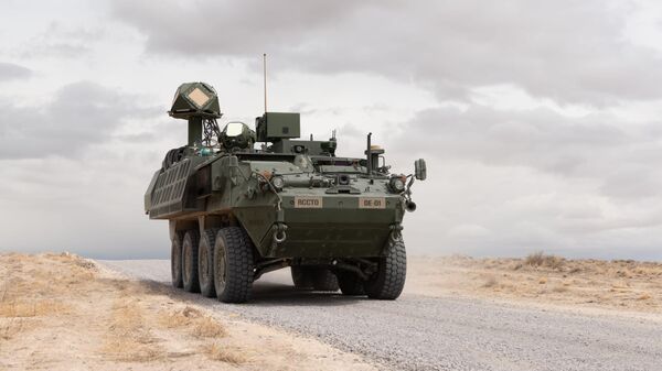 A 50-kilowatt-class laser mounted on a US Army Stryker vehicle , shown during a live-fire exercise at White Sands Missile Range in New Mexico. Part of the U.S. Army’s Directed Energy Maneuver-Short Range Air Defense, or DE M-SHORAD. - Sputnik International