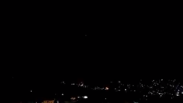 A screenshot from the video allegedly showing an air attack in the sky over Damascus, Syria, on May 20, 2022. - Sputnik International