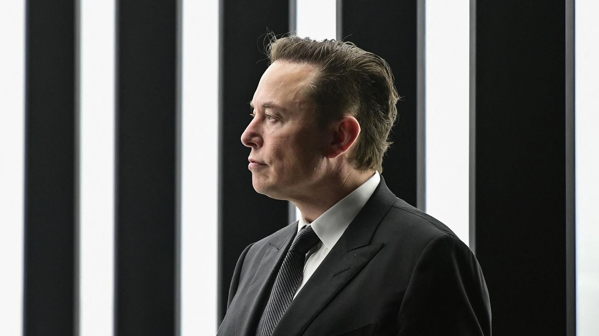 Tesla CEO Elon Musk is pictured as he attends the start of the production at Tesla's Gigafactory on March 22, 2022 in Gruenheide, southeast of Berlin - Sputnik International, 1920, 21.05.2022
