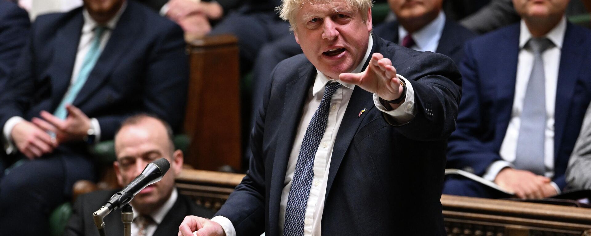 A handout photograph released by the UK Parliament shows Britain's Prime Minister Boris Johnson speaking during the first day of a debate on the Queen's Speech, in the House of Commons, in London, on May 10, 2022 - Sputnik International, 1920, 28.05.2022