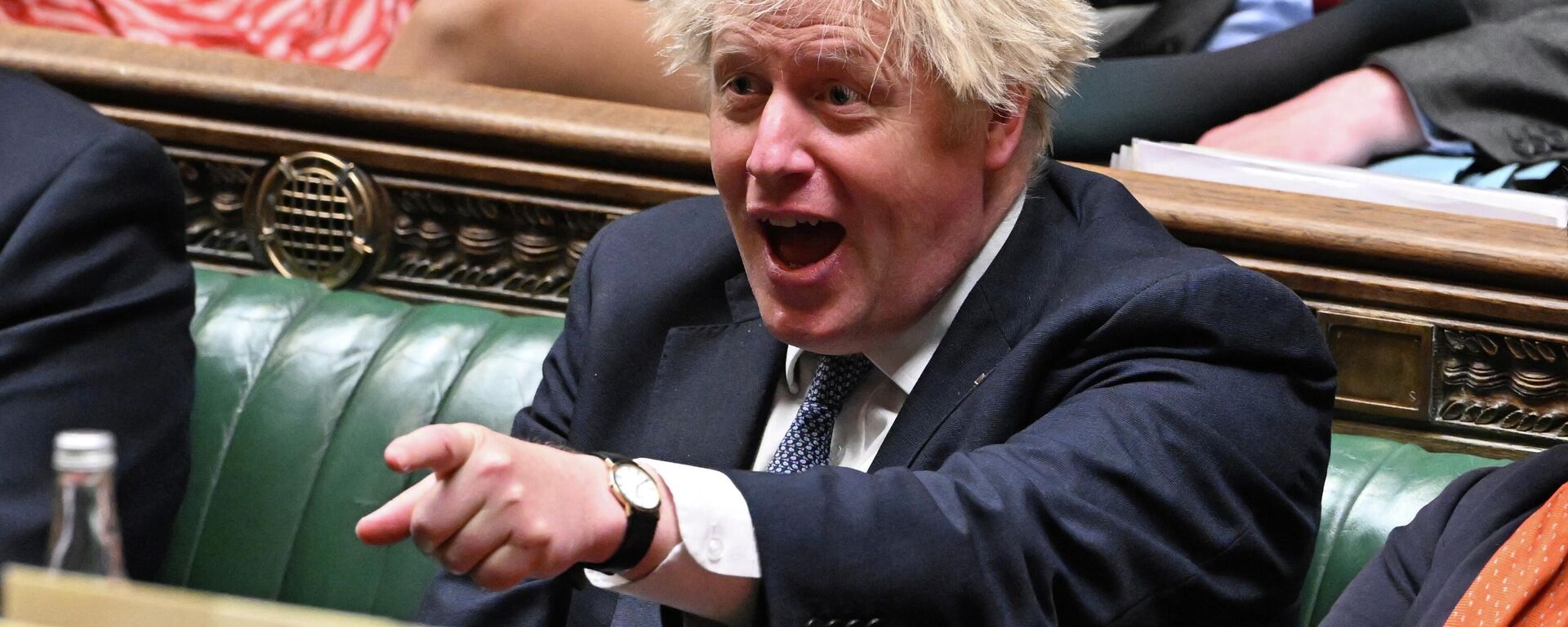 A handout photograph released by the UK Parliament shows Britain's Prime Minister Boris Johnson laughing as Britain's Chancellor of the Exchequer Rishi Sunak makes a statement on the cost of living crisis in the House of Commons on May 26, 2022 - Sputnik International, 1920, 15.06.2022