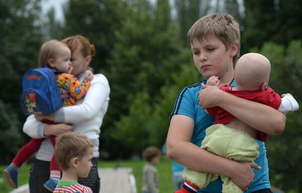 Refugees from Ukraine’s Slavyansk town, which became a symbol of Donbass resistance in 2014. They left their homes, fleeing the Ukrainian National Guard’s bombing and shelling. This is how people fled the war zone – abandoning personal items and losing property, housing, and their loved ones. - Sputnik International