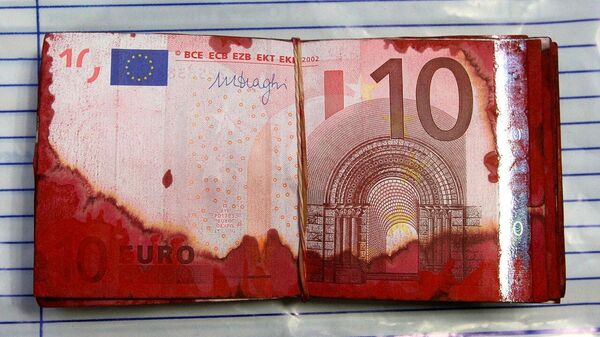  With red paint made ​​unusable € 10 notes from a cash machine robbery - Sputnik International