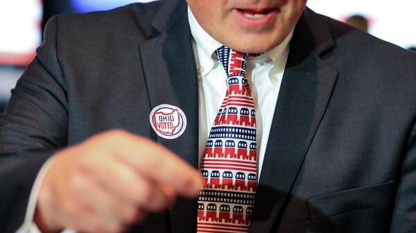 A supporter wears a tie with the Republican Party logo during an election night watch party, Tuesday, May 3, 2022, in Cincinnati - Sputnik International