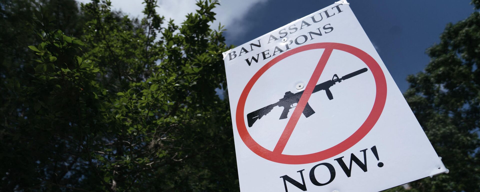 HOUSTON, TX - MAY 27: A gun control advocate holds a sign during a protest across from the National Rifle Association Annual Meeting at the George R. Brown Convention Center, on May 27, 2022 in Houston, Texas.  - Sputnik International, 1920, 22.06.2022