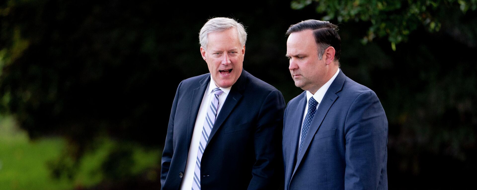 White House social media director Dan Scavino, right, and White House chief of staff Mark Meadows, left, walk to board Marine One with President Donald Trump on the South Lawn of the White House, Tuesday, Sept. 22, 2020, in Washington. - Sputnik International, 1920, 04.06.2022