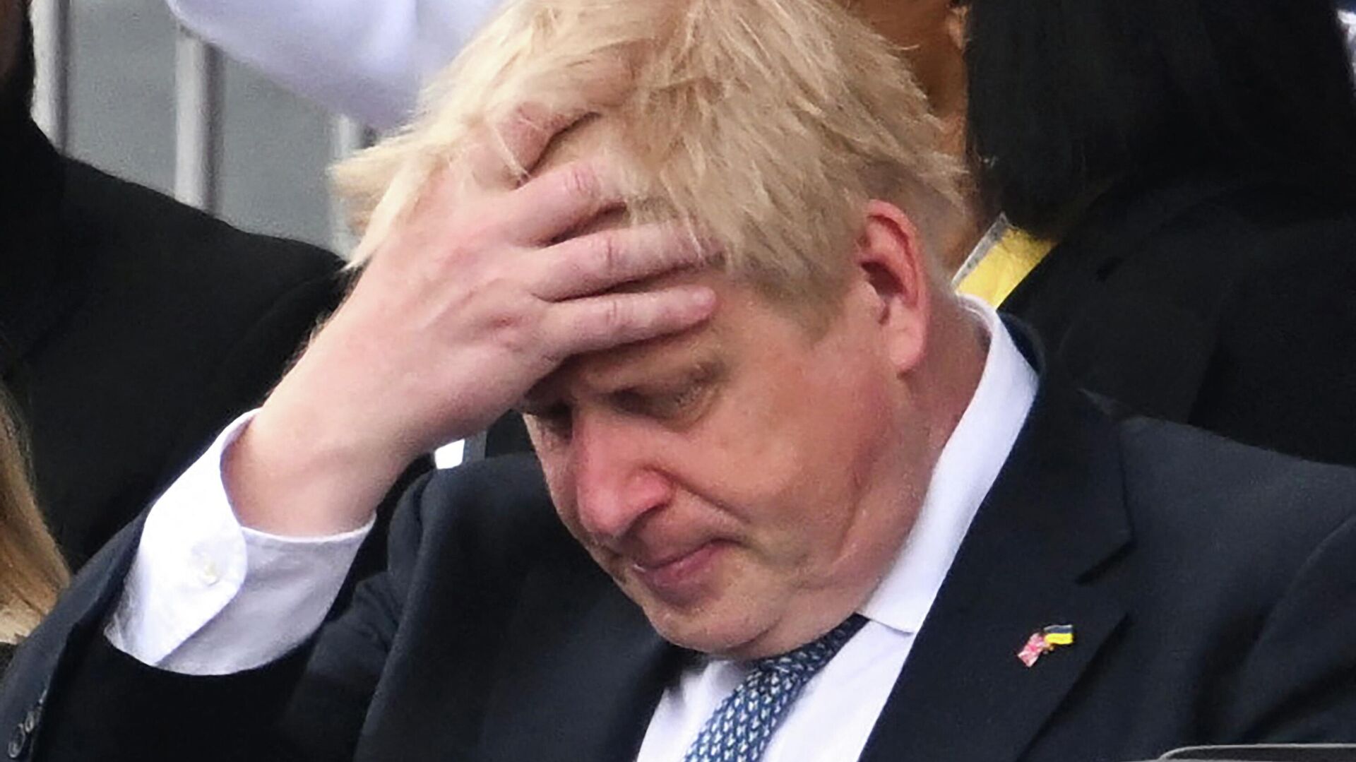 (FILES) In this file photo taken on June 5, 2022 shows Britain's Prime Minister Boris Johnson reacts during the Platinum Pageant in London on June 5, 2022 as part of Queen Elizabeth II's platinum jubilee celebrations - Sputnik International, 1920, 04.07.2022