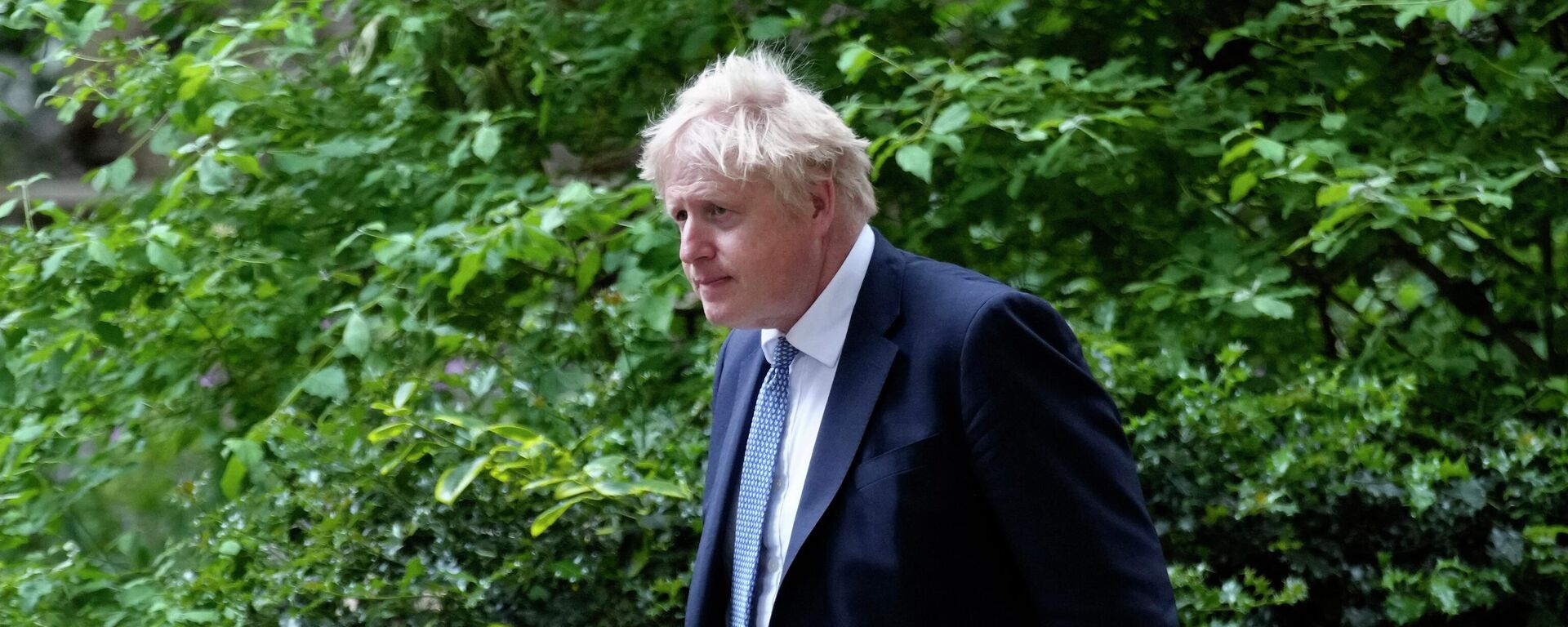 Britain's Prime Minister Boris Johnson walks down Downing Street after a press conference in London, Wednesday, May 25, 2022 - Sputnik International, 1920, 06.06.2022