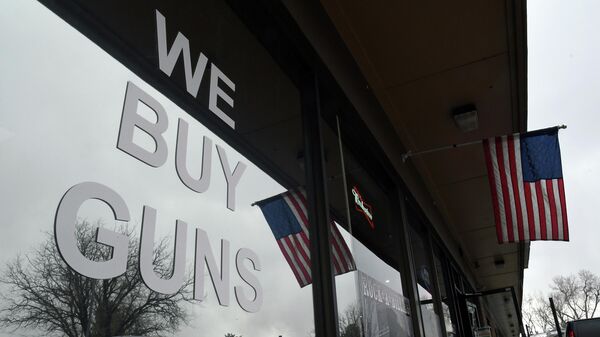 This photo on Friday, March 26, 2021, shows the front door of the Eagles Nest Armory gun shop in Arvada, Colo. - Sputnik International