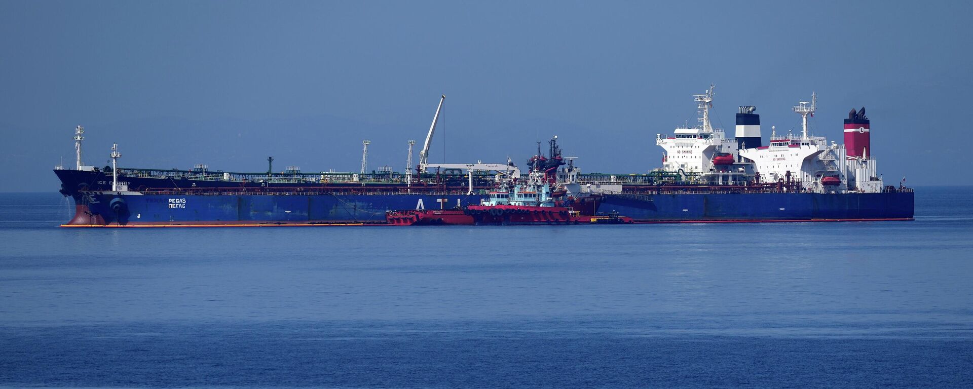 The Pegas tanker, that has recently changed its name to Lana, is seen off the port of Karystos on the Aegean Sea island of Evia, Greece, Friday, May 27, 2022. The crude oil cargo of the Iranian-flagged tanker that was stopped in Greek waters last month has been seized and is being transferred to another vessel following a request from the U.S., a Greek official said Thursday. (AP Photo/Thanassis Stavrakis) - Sputnik International, 1920, 07.09.2023