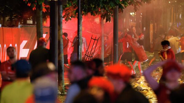Liverpool supporters react as Real Madrid win the Champions League Final at the fan park in Paris, France, Saturday, May 28, 2022 - Sputnik International