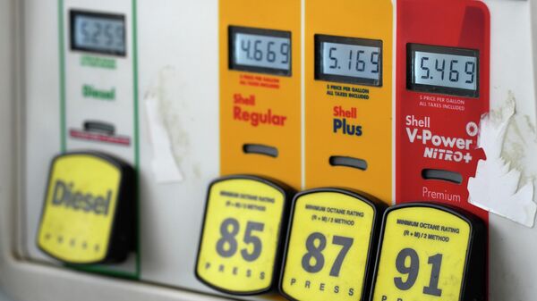 Prices per gallon are displayed over labels of various grades of gasoline at a Shell station Thursday, June 9, 2022, in Littleton, Colo. - Sputnik International