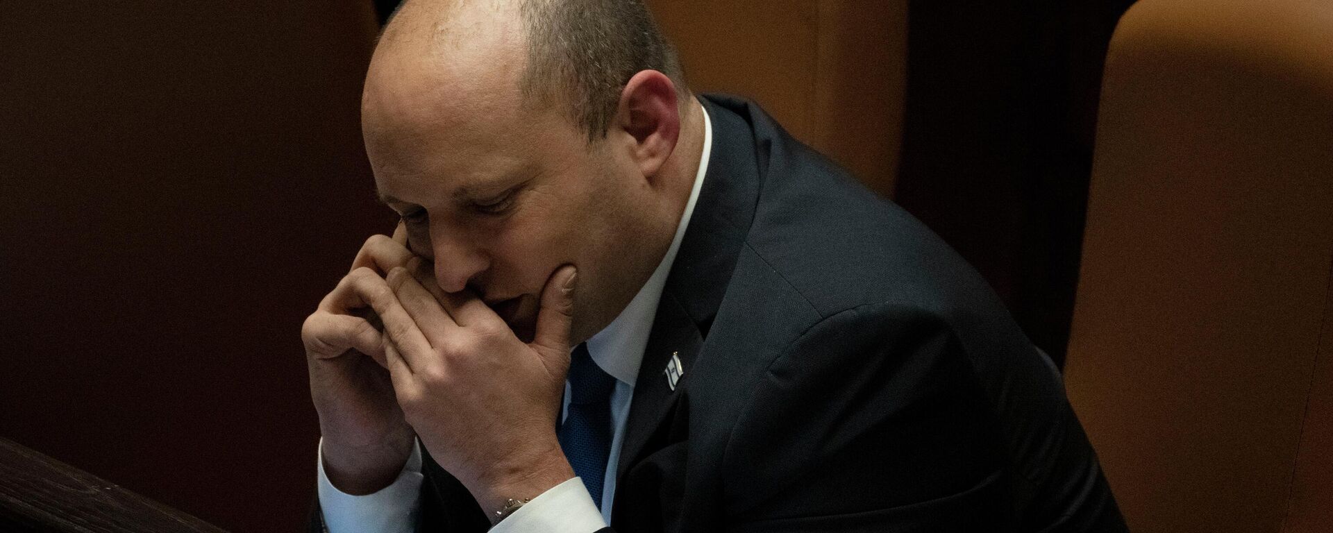 Israeli Prime Minister Naftali Bennett makes a call before voting on a law on the legal status of Jewish settlers in the occupied West Bank, during a session of the Knesset, Israel's parliament, in Jerusalem, Monday, June 6, 2022.  - Sputnik International, 1920, 13.06.2022