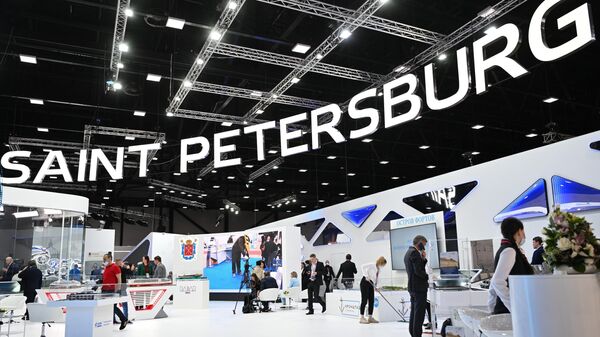 Participants stand at the stall of the city of St. Petersburg at the Saint Petersburg International Economic Forum (SPIEF) in St. Petersburg, Russia - Sputnik International