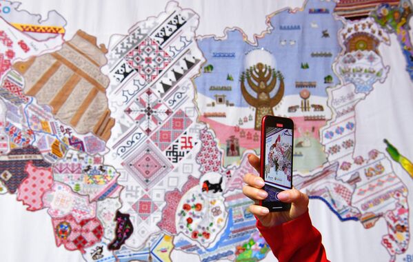 An embroidered map of Russia is seen at the Saint Petersburg International Economic Forum (SPIEF) in Russia. - Sputnik International