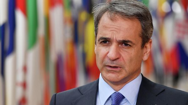 Greek Prime Minister Kyriakos Mitsotakis speaks to media prior the extraordinary meeting of EU leaders to discuss Ukraine, energy and food security at the Europa building in Brussels, Monday, May 30, 2022 - Sputnik International