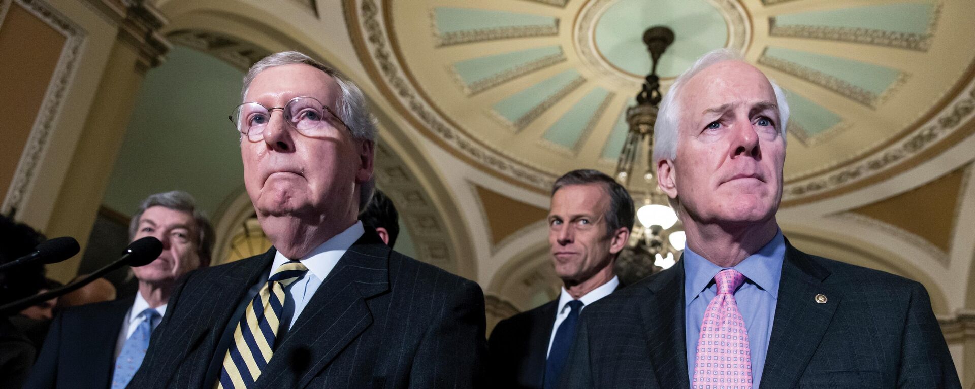 Sen. Mitch McConnell, R-Ky., left, and Sen. John Cornyn, R-Texas, right, talk to reporters following a closed-door policy meeting at the Capitol in Washington, Tuesday, March 8, 2016. In the aftermath of recent horrific mass shootings in Uvalde, Texas and Buffalo, New York, a bipartisan group of senators, including Cornyn and Sen. Chris Murphy, D-Conn., are holding private virtual meetings during recess to try to strike a compromise over gun safety legislation.  - Sputnik International, 1920, 23.06.2022