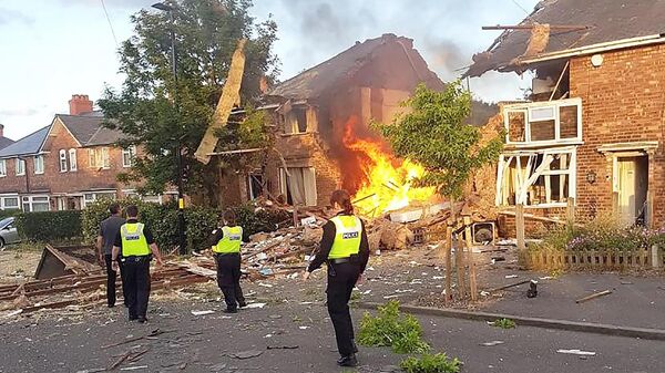 Police outside the destroyed house in Kingstanding, Birmingham - Sputnik International
