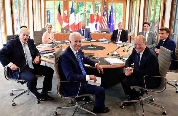 (From foreground C-R, clockwise) Germany&#x27;s Chancellor Olaf Scholz, US President Joe Biden, Britain&#x27;s Prime Minister Boris Johnson, European Commission President Ursula von der Leyen, European Council President Charles Michel, Italy&#x27;s Prime Minister Mario Draghi, Canada&#x27;s Prime Minister Justin Trudeau and France&#x27;s President Emmanuel Macron sit at a round table for their first working session on 26 June 2022 at Elmau Castle, southern Germany, where the German Chancellor is hosting a summit of the Group of Seven nations (G7) - a gathering of the world&#x27;s seven wealthiest nations. - Sputnik International