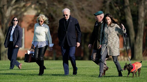 FILE - President Joe Biden and first lady Jill Biden walk with Col. David Bowling, commander of Joint Base Myer-Henderson Hall, second from right, and his daughter Ashley Biden after stepping off Marine One at Fort Lesley J. McNair, Sunday, April 17, 2022, in Washington - Sputnik International
