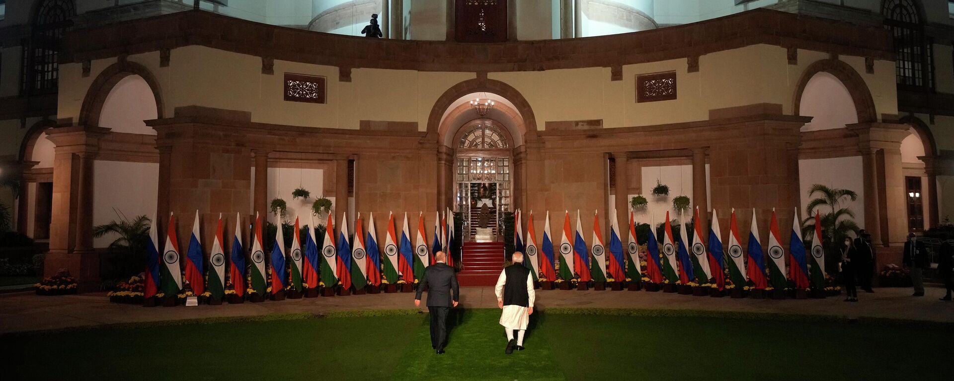 Indian Prime Minister Narendra Modi, right, with Russian President Vladimir Putin leave for their delegation level meeting after a photo call, in New Delhi, India, Monday, Dec.6, 2021. - Sputnik International, 1920, 28.06.2022