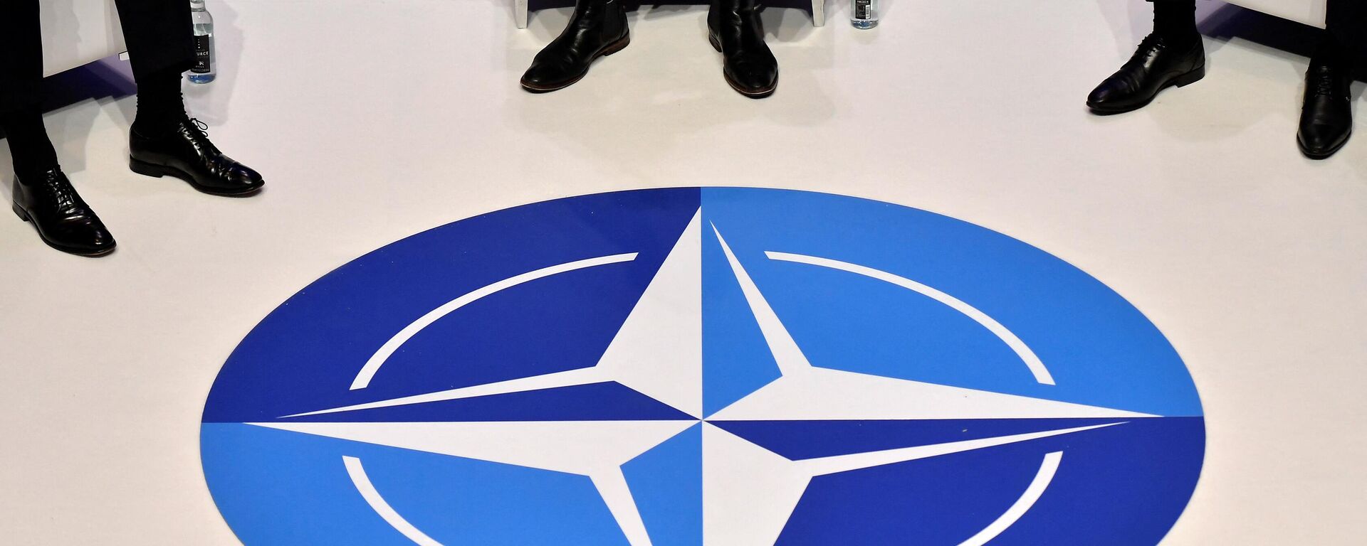 The Nato logo is pictured during a panel discussion at an official NATO outreach event, 'Nato Engages' in central London on December 3, 2019, prior to the NATO alliance summit - Sputnik International, 1920, 28.06.2022