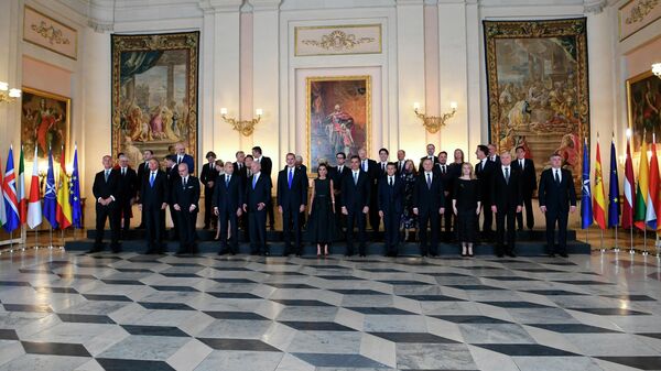 Heads of State and Government and Heads of International Organizations, invited to the official NATO summit, pose for a family picture before a dinner hosted by His Majesty King of Spain and Her Majesty Queen of Spain at the Royal Palace in Madrid, Tuesday, June 28, 2022 - Sputnik International