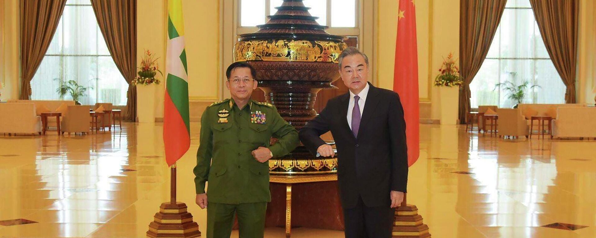 In this Jan. 12, 2021, file photo provided by Myanmar Military Information Team, Myanmar's Army Commander Senior Gen. Min Aung Hlaing, left, and Chinese Foreign Minister Wang Yi pose for a photo during their meeting in Naypyitaw, Myanmar. - Sputnik International, 1920, 29.06.2022