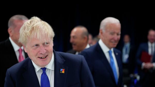 British Prime Minister Boris Johnson arrives for a round table meeting at the NATO summit in Madrid, Spain - Sputnik International
