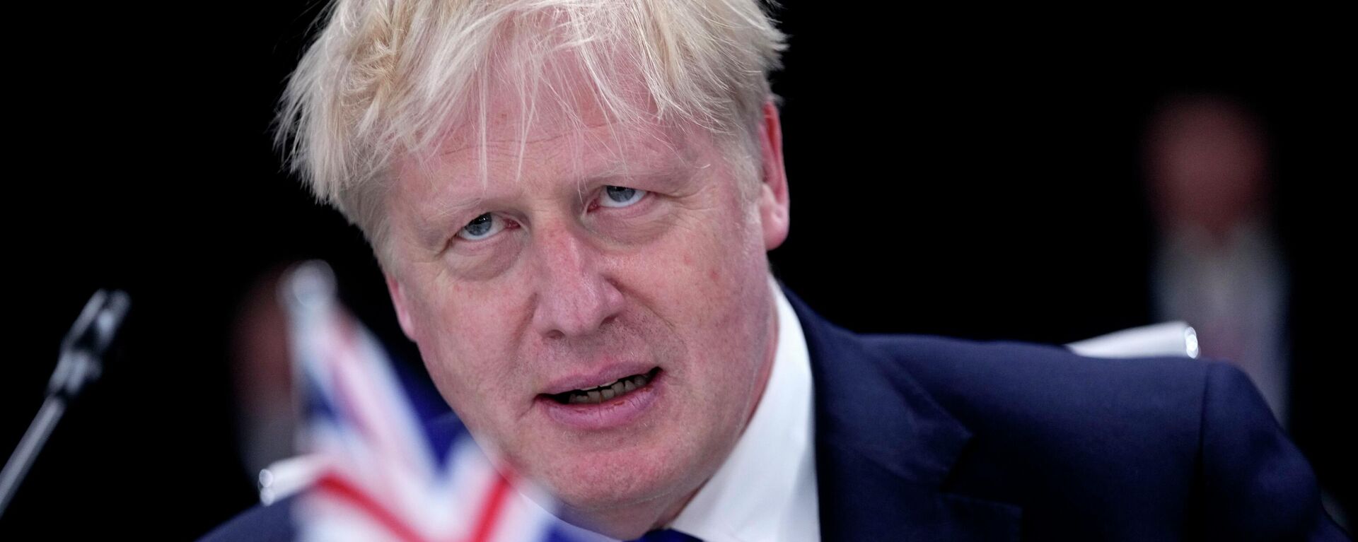 British Prime Minister Boris Johnson waits for the start of a round table meeting at a NATO summit in Madrid, Spain on Wednesday, June 29, 2022 - Sputnik International, 1920, 30.06.2022