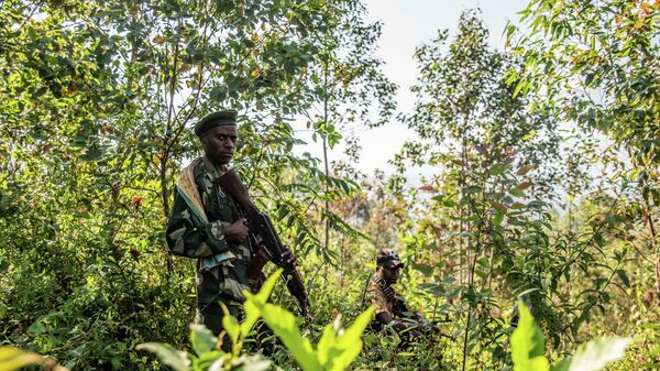 Armed militiamen gather near Rutshuru, 70 kms (45 miles) north of Goma, Democratic Republic of Congo,Wednesday June 22, 2022. - Sputnik International