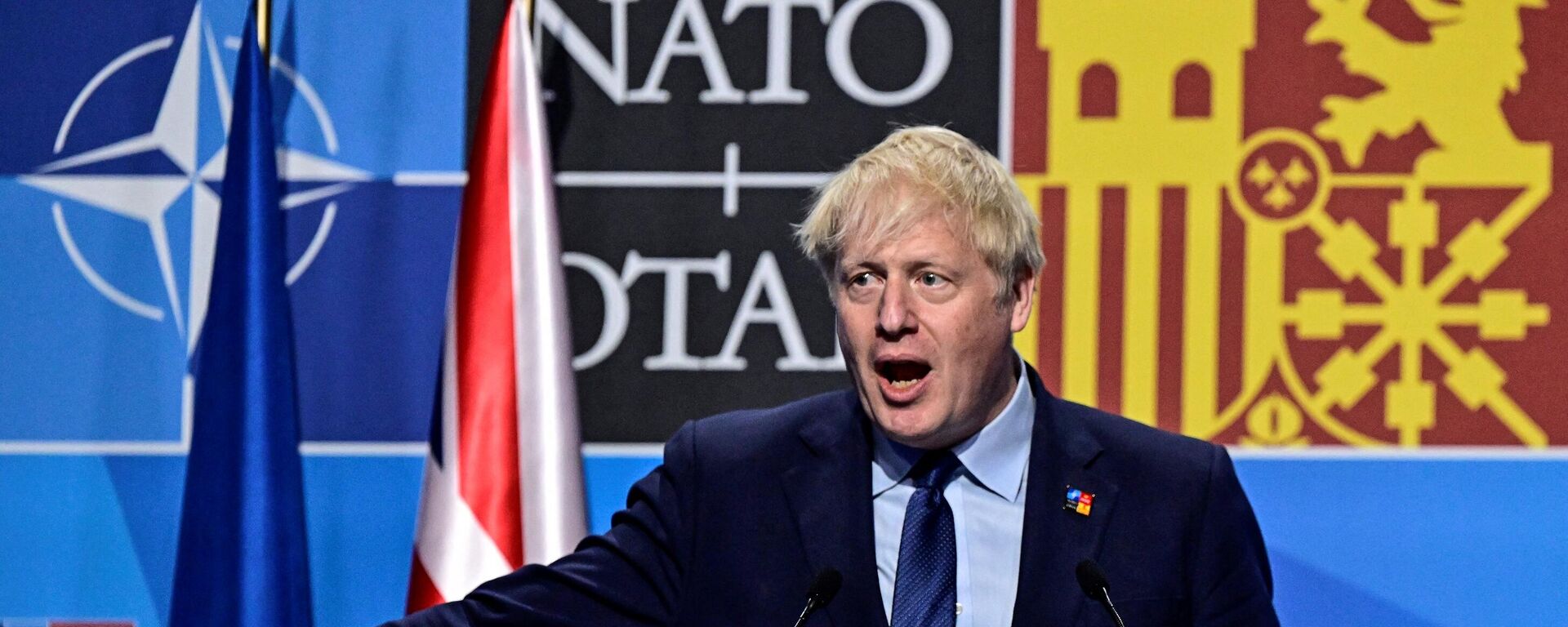 Britain's Prime Minister Boris Johnson gestures as he addresses media representatives during a press conference at the NATO summit at the Ifema congress centre in Madrid, on June 30, 2022. - Sputnik International, 1920, 01.07.2022