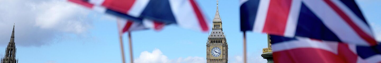 Union Jack flags are seen surrounding the Elizabeth Tower, known as Big Ben, beside the Houses of Parliament in London, Friday, June 24, 2022. - Sputnik International