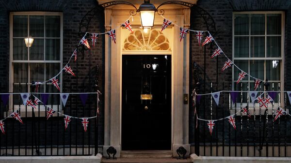 A general view at dusk of 10 Downing Street in London, Monday, June 6, 2022. British Prime Minister Boris Johnson survived a no-confidence vote on Monday, securing enough support from his Conservative Party to remain in office despite a rebellion that leaves him a weakened leader with an uncertain future. - Sputnik International