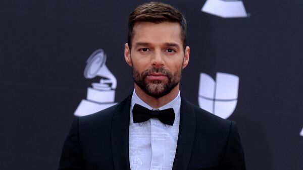 In this file photo taken on November 14, 2019 Puerto Rican musician and host Ricky Martin arrives at the 20th Annual Latin Grammy Awards in Las Vegas, Nevada. - Sputnik International
